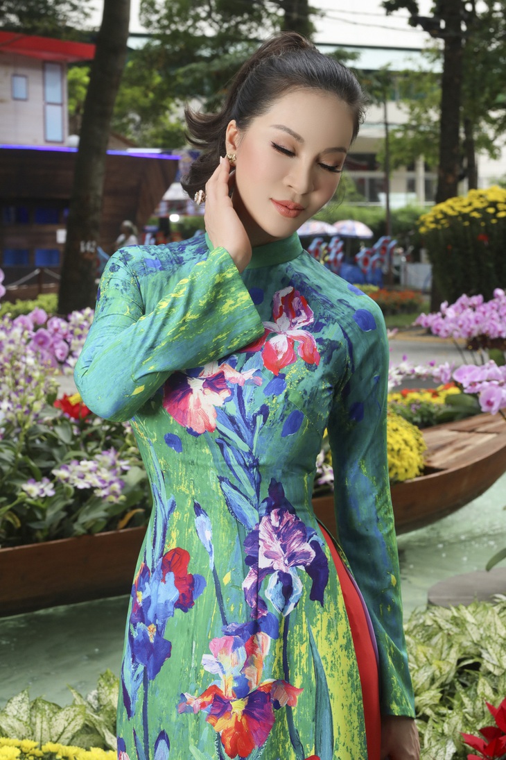 Nữ hoàng ảnh lịch Thanh Mai xúng xính áo dài đón Tết - Ảnh 6.