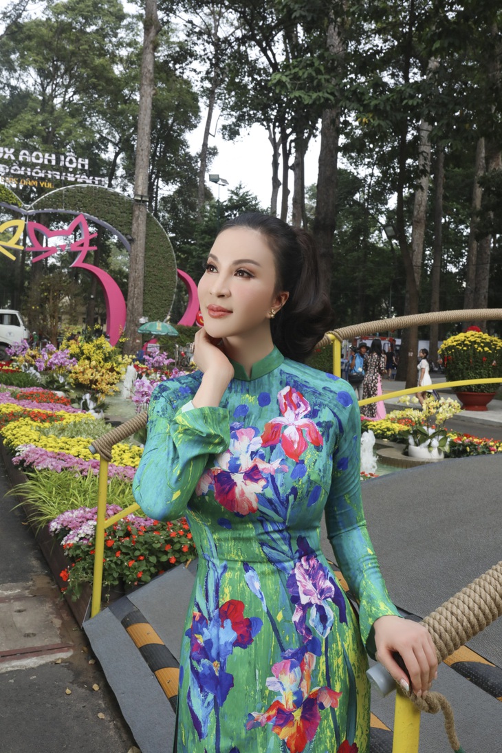 Nữ hoàng ảnh lịch Thanh Mai xúng xính áo dài đón Tết - Ảnh 14.