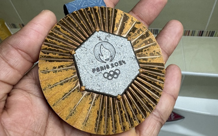 Nữ ngôi sao Olympic Trung Quốc bị chỉ trích vì đăng ảnh 'Photoshop đến mức không thể nhận ra cô' - Ảnh 2.