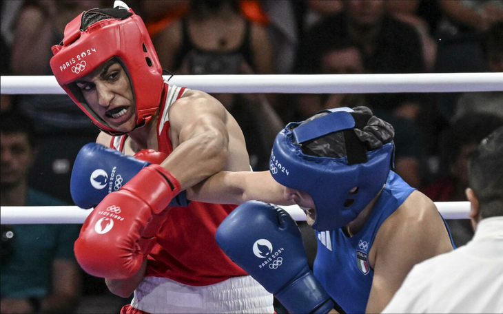 Nhà vô địch quyền anh Olympic Imane Khelif phủ nhận tin đồn giải nghệ giữa tranh cãi giới tính - Ảnh 2.
