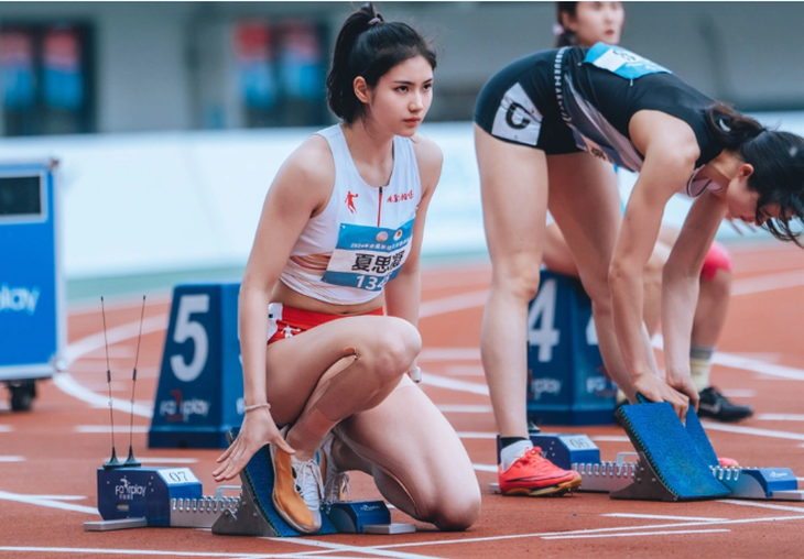 Sao nữ điền kinh Trung Quốc hoá 'thần tiên tỉ tỉ' với trang phục cổ trang - Ảnh 3.