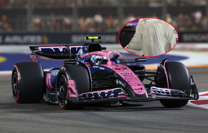 Các tay đua F1 dùng áo đá lạnh chống nóng trên đường đua Singapore - Ảnh 1.