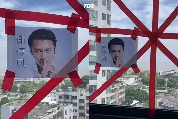 Netizen Trung Quốc dán hình Tạ Đình Phong lên cửa kính để chống bão - Ảnh 1.