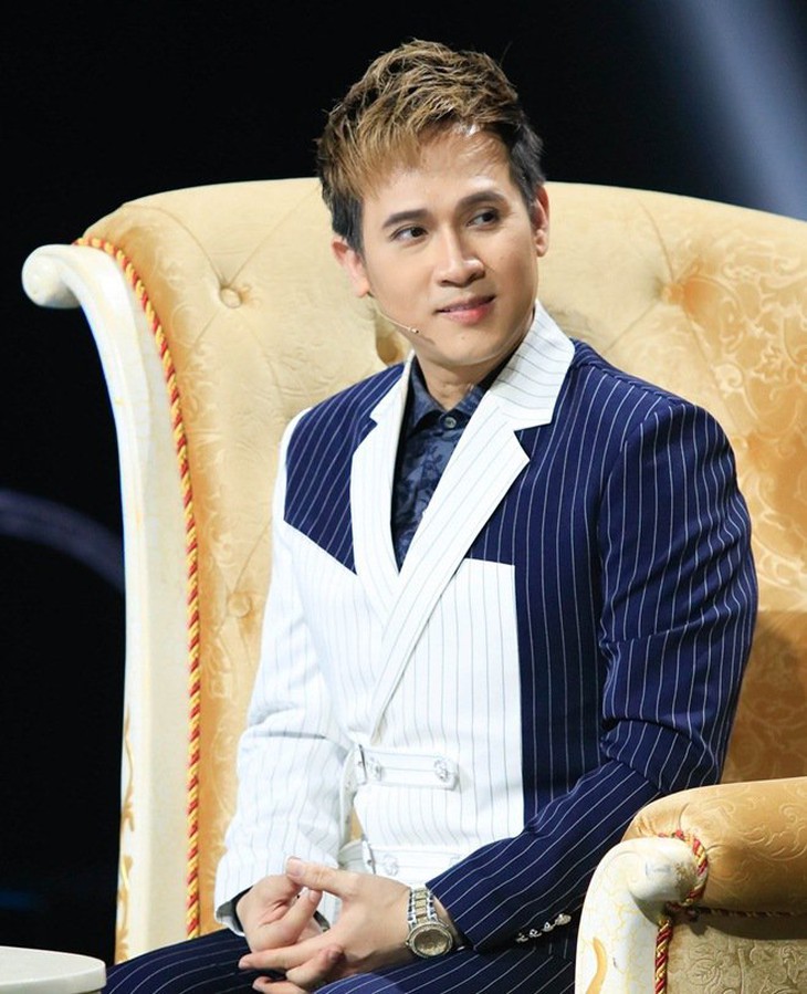 Nguyên Vũ mua bản quyền hát 'Say một đời vì em', đối đầu với ca sĩ AI - Ảnh 2.