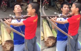 Người bố nhổ răng cho con trai bằng cách... dùng cây nỏ khiến người xem ngỡ ngàng