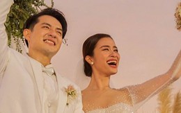 Đông Nhi ôm con 'cười rung giường' xem loạt ảnh lầy trong đám cưới