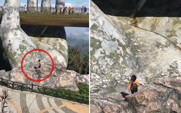 Du khách leo xuống bàn tay khổng lồ ở Cầu Vàng 'thách thức tử thần'