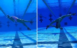 Cô gái lặn dưới hồ bơi biểu diễn đi 360 độ bằng giày cao gót