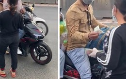 Người phụ nữ phát từng 500 ngàn cho dân hồi hương trên quốc lộ 1A