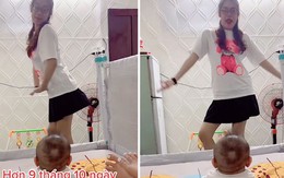 Mẹ bỉm sữa nhún nhảy hát khi trông con