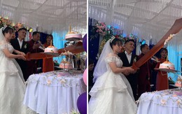 Ảnh vui 19/1: Cô dâu chú rể cầm đồ long đao cắt bánh cưới