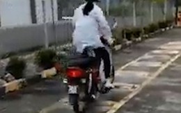 Cô gái chạy xe máy nhảy như cóc khi thi vòng vượt chướng ngại vật