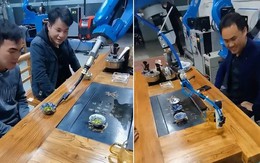 Robot thay chủ rót nước trà tiếp khách ngày Tết