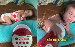 Bé gái ham ngủ bị bố lấy loa kêu dậy