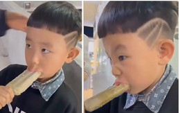 Bé trai bị kem dính chặt miệng