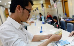 Đổi tiền mới dịp Tết: sao không là niềm vui?