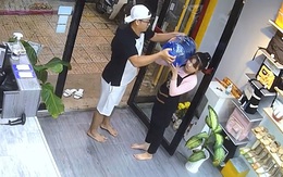 Cô gái đứng hình khi được chàng trai giúp bê thùng nước