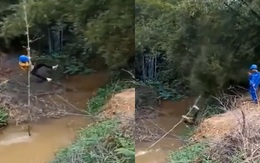 Pha chống xào nhảy qua mương nước đi vào lòng đất