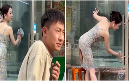 Chàng trai bị bạn gái đánh vì mải nhìn người đẹp lau kính