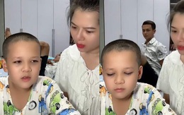 Bố đang nằm hoảng hồn bật dậy khi nghe con làm văn miêu tả