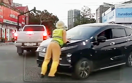 Thiếu tá cảnh sát giao thông bị hất lên nắp ca pô giờ tan tầm