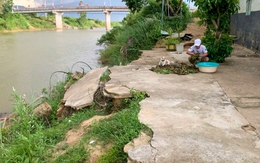 Người dân thấp thỏm bên bờ sông sạt lở trước bão Thần Gió