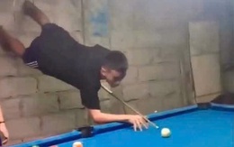Ảnh vui 22-10: Thanh niên chơi bida... ngược