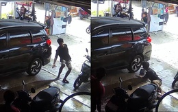 Chàng trai nhanh trí khi thấy ô tô đang rửa bị trôi bánh