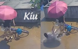 Em gái chạy ra cứu chị suýt ngã nhưng... không đáng kể