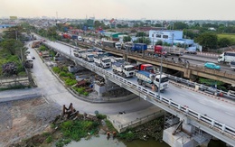 Xem cảnh 10 xe tải lớn 'thử sức' cầu Bình Phước 1 sau khi nâng cao thêm