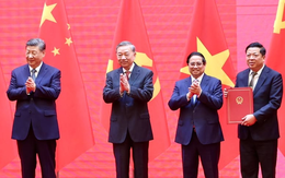 Bộ Xây dựng ký kết 7 văn kiện về đường sắt, đường bộ với Trung Quốc