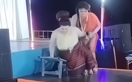 Người đẹp trượt chân ngã cong bậc tam cấp sắt