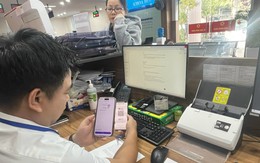 Dân 'khoái' thanh toán không tiền mặt khi làm thủ tục dịch vụ công