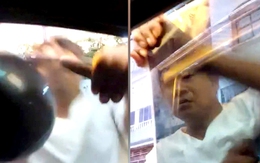 Công an làm việc với người đập phá kính taxi công nghệ