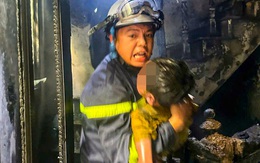 Giải cứu 3 người kẹt trong ngôi nhà đang cháy to, cảnh sát bế em nhỏ thoát nạn