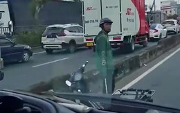 Xác minh clip tài xế xe ôm công nghệ đập vỡ kính chiếu hậu xe tải trên đường Lê Quang Đạo