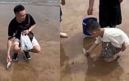 Hai bé trai khoái chí khi bố dẫn ra biển bắt được cá nước ngọt