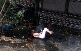 Cô gái 'ngã dập mông' khi hớt hải chạy ra cổng