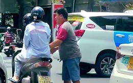 Làm rõ tài xế xe công nghệ rút chìa khóa xe máy của cô gái rồi bỏ đi ở hồ Con Rùa