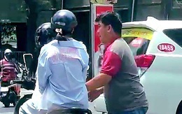 Đưa tài xế xe công nghệ rút chìa khóa xe máy của cô gái ở hồ Con Rùa về trụ sở làm việc