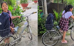 Cảm động với cô bé ngày nào cũng tự đạp xe đến trường