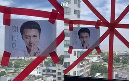 Netizen Trung Quốc dán hình Tạ Đình Phong lên cửa kính để chống bão