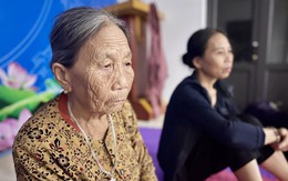 Bà con đi trú bão Bualoi âu lo mái nhà sau bão